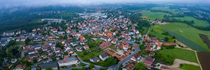Aerial view of the village Behringersdorf beside the city Schwaig in Germany, Bavaria on a cloudy morning day in Spring