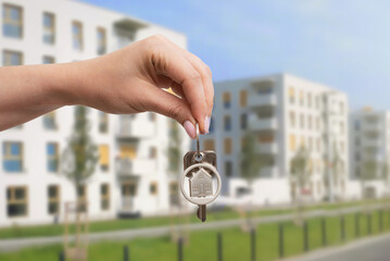 Hand with keys, own apartment concept