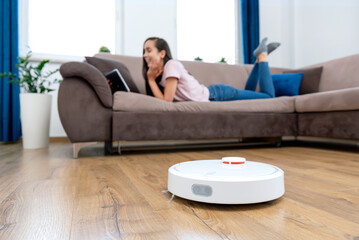 Robotic vacuum cleaner cleaning the room