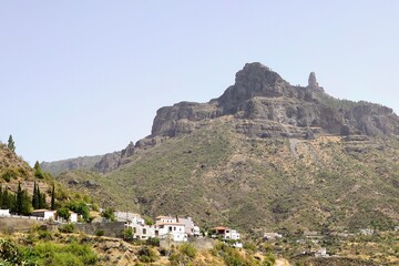 Fototapeta premium Tejeda village and Roque Nublo in background, Gran Canaria island, Canary islands, Spain