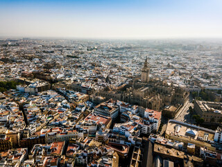 Fototapeta na wymiar Aerial view of Seville with enormous Cathedral of Seville, Spain