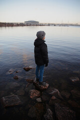 child on the lake