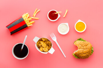 Fried chicken nuggets and burger potatoes with sauce