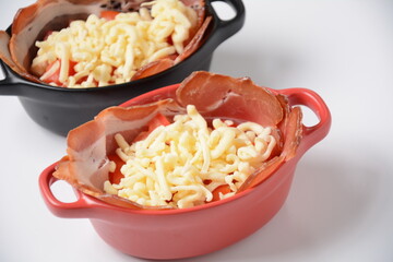 Process of cooking Omelette  with bacon, grated parmesan and greens