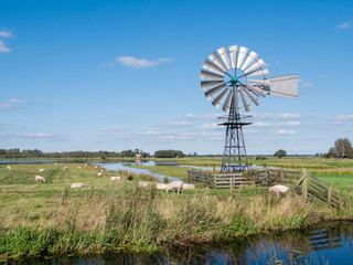 Windwatermill draining wetland polder, water level control in national park Alde Feanen, Friesland,...