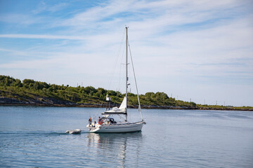 Fototapeta na wymiar Sailboat - Great day at sea with 29c in the shade,Helgeland,Nordland county,scandinavia,Europe 