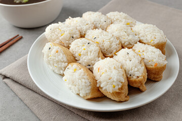 Tofu sushi with rice wrapped in tofu