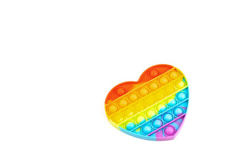 Silicon modern Toy anti-stress popit will be a heart on a white background. toy pop it or simple dimple.