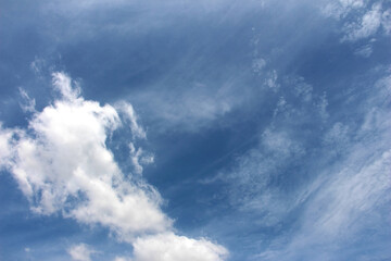 bright blue sky white clouds blue background