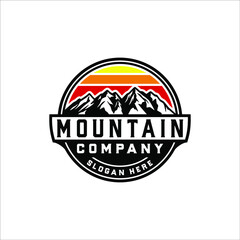 Mountain and retro sunset with badge design
