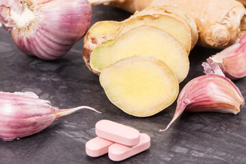 Pills or tablets and healthy natural food, natural treatment of diseases concept