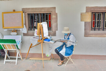 person painting a picture