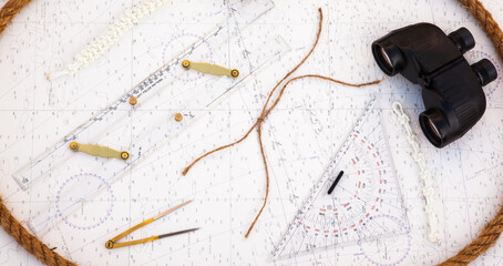 Navigation tools are on the navigation map. Plotter, divider, ruler and binoculars as well as the Manila rope.