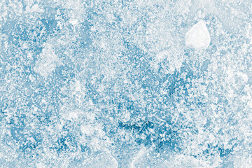 Natural blue-toned ice natural background with hoarfrost crystals.