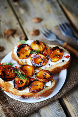 Bruschetta with dried apricots. Healthy sandwiches with apricot and white cheese.