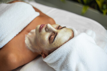 Obraz na płótnie Canvas Woman in beauty salon face skin care