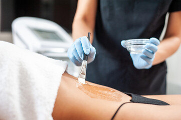 Anti-cellulite therapy for women in a beauty salon. Skin care