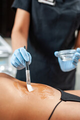 Naklejka premium Anti-cellulite therapy for women in a beauty salon. Skin care