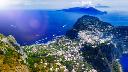 Capri coastline from a high flying drone over Mt Solaro in summer season.