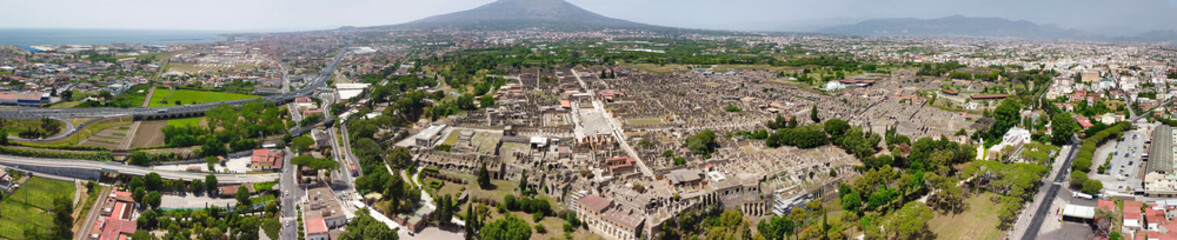 Fototapeta na wymiar Pompei, Italy. Aerial view of old city from a drone viewpoint in summer season.