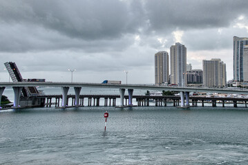 Beautiful skyline of Miami at sunrise with Sea and Tall Skyscrapers