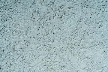 blue wall plaster texture with abstract pattern