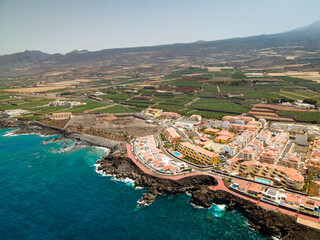 Tenerife, San Juan a town on the Atlantic Ocean. Sunny coast and port city. Ocean, water, waves,...