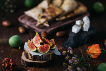 Figs on a plate with cheese and focaccia 