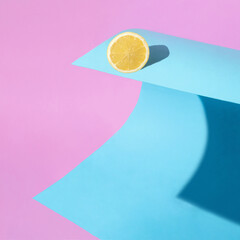 Creative fruit summer composition with lemon on the wave. Minimal sea concept.