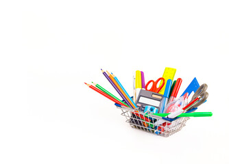shopping cart with stationery on a white background