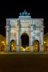 Fototapeta na wymiar The Siegestor (Victory Gate) in Munich on a summer night