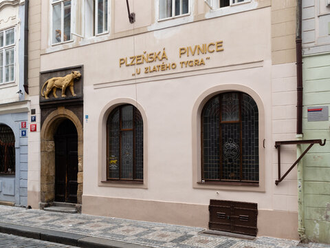 Prague, Czech Republic - July 3 2021: Plzenska Pivnice U Zlateho Tygra, Pilsner Beer Hall and Pub At the Golden Tiger in the Old Town.