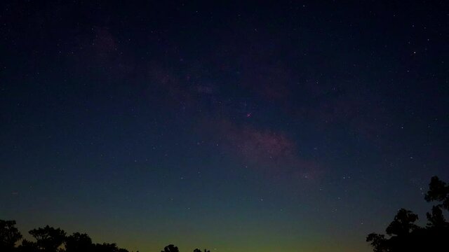 Falling stars in June sky during a hot night, time lapse