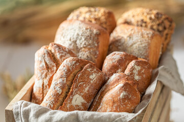 Crunchy buns baked at home. Buns from the bakery.
