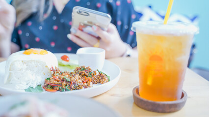 Rice topped with stir fried pork and basil.