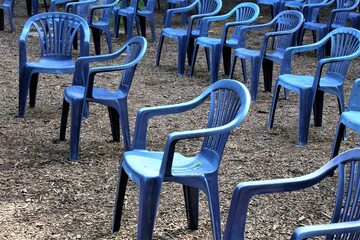 rows of chairs in the park