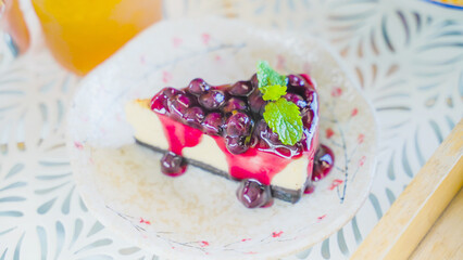 Cream cake on a simple background. Dyeing. Focus on the spot.