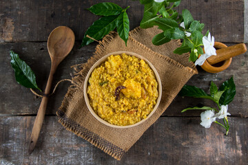 Bengali dish khichdi or khichuri made from a combination of lentils and rice along with Indian...