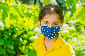 Little girl with mask
