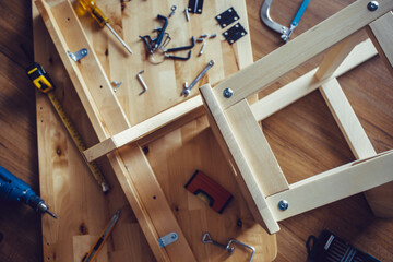 DIY concepts with wood furniture and tool and another equipment.assembly,improvement or repairing...