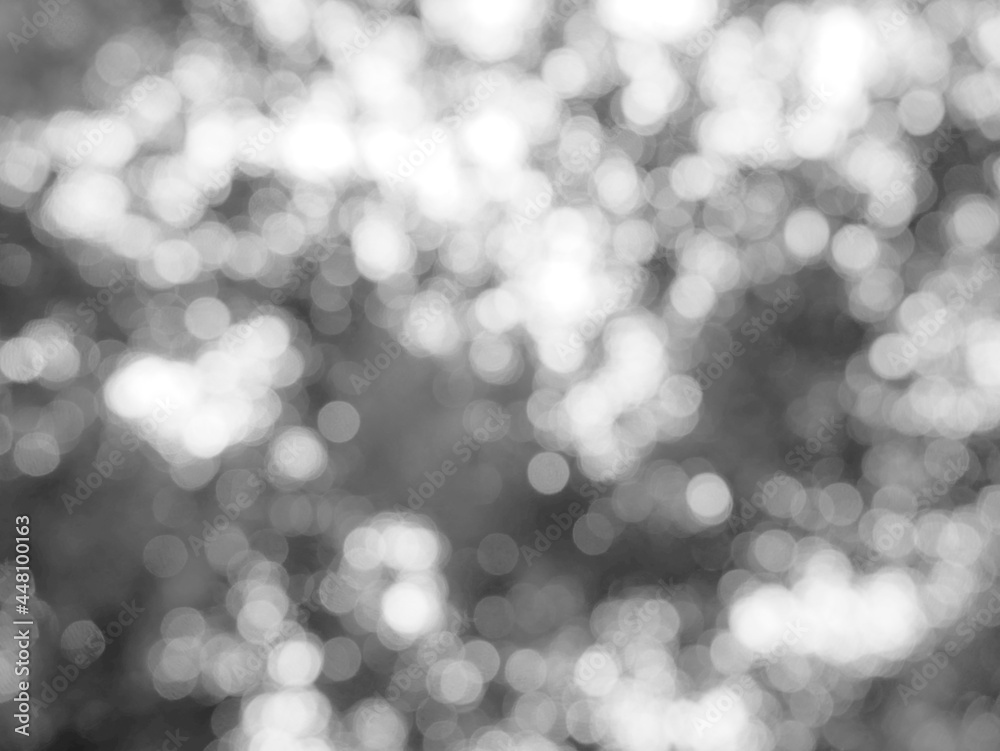 Fototapete the illuminated white bokeh image can be used as a background illustration or add text.