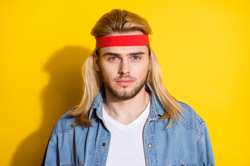 Photo of charming attractive young gentleman wear jeans shirt isolated yellow color background