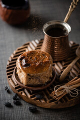 bun with coffee dark background. High quality photo