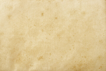 background of empty stained old paper, top view