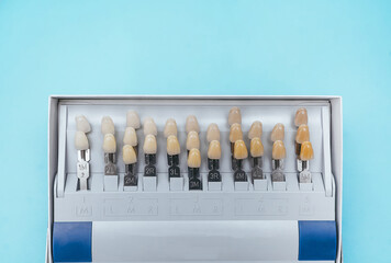 Teeth color samples on blue background