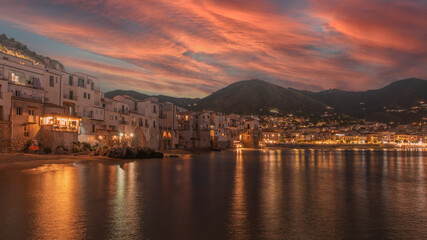 night view of famous little town Cefalù, Siciliy, Italy - Travel concept.