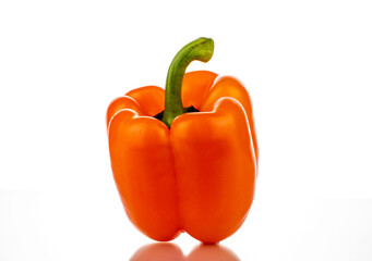 One ripe bell pepper, close-up, isolated on white.