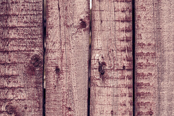 Grunge faded texture. Painted wood with scuffs and inclusions. Close-up image of a natural aged fence