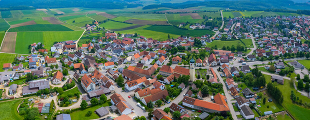 Aerial view around the village Ohmenheim in Germany, Bavaria on a cloudy rainy day in Spring