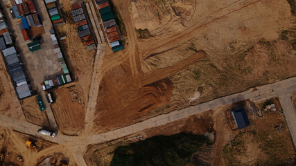 Construction site for a new city block. Construction work is underway. Aerial photography.